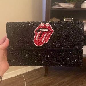 Black sequin rock and roll clutch